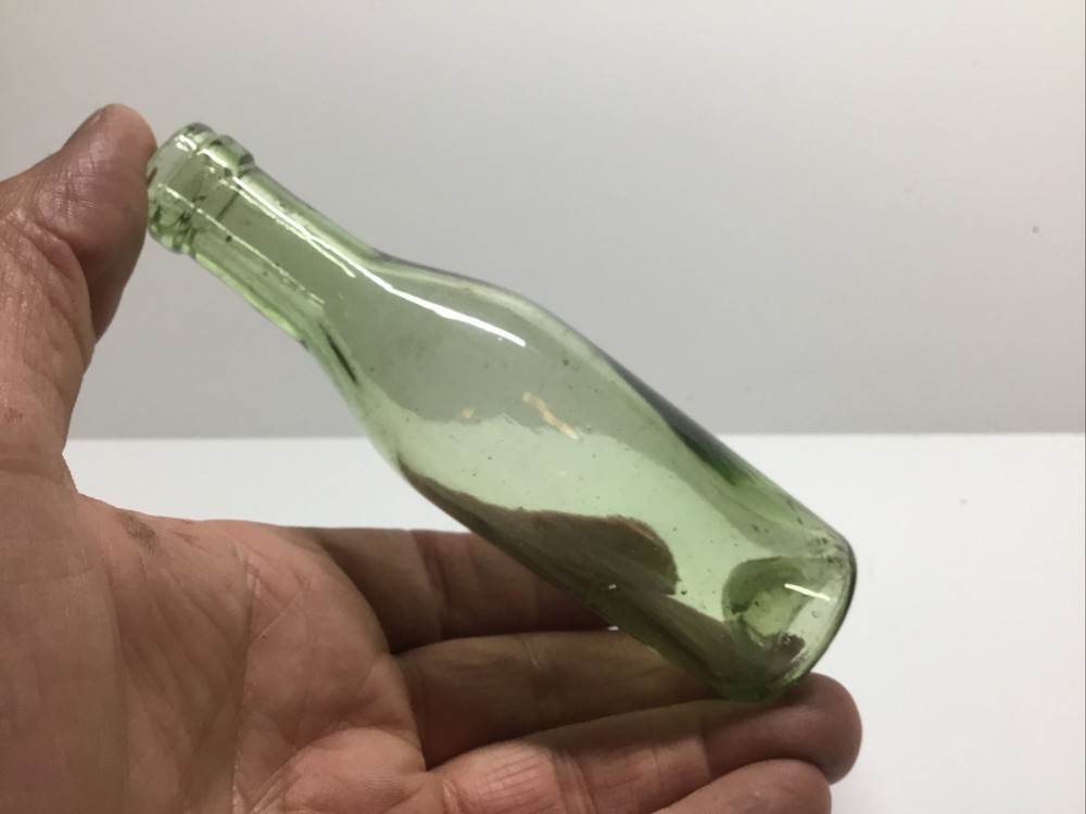Antique Push Up Base Sample Size Wine Bottle.