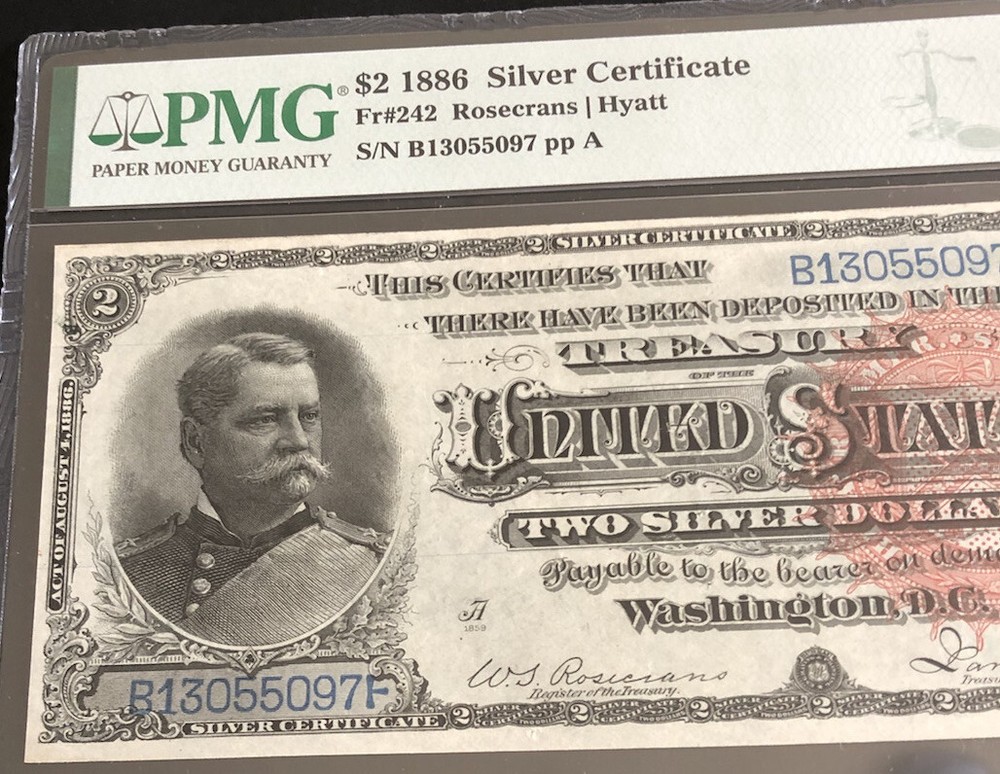 1886-$2 SILVER CERTIFICATE in PMG-58 w/pinholes. Nice note. Fr# 242. Nice note.