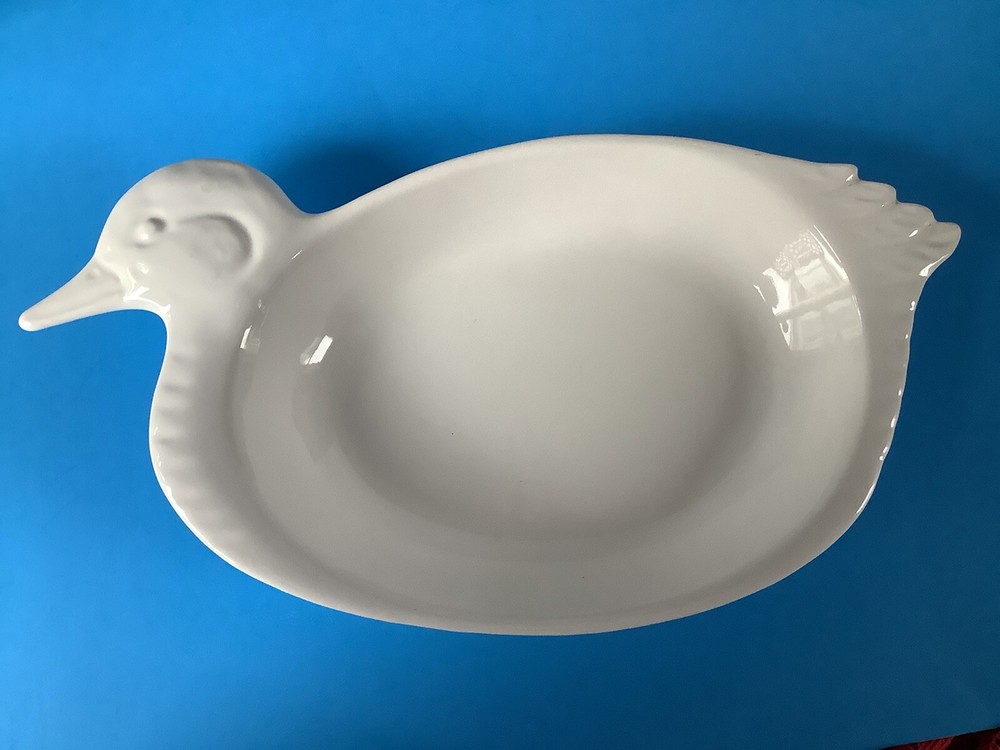 White ceramic duck-shaped platter