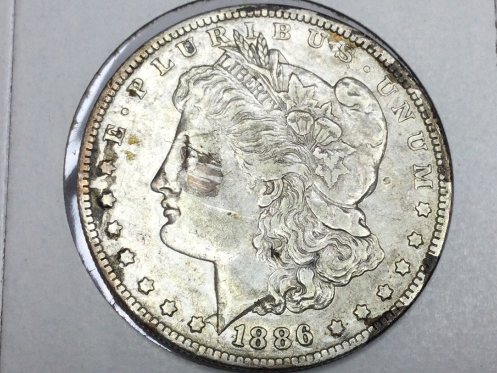 1886-O Morgan Dollar in extra fine