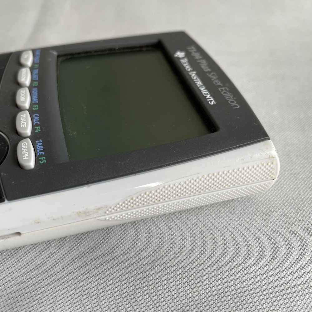 Texas Instruments TI-84 Plus Silver Edition Graphing Calculator pre-owned