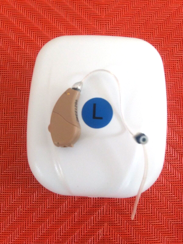 programmable DIGITAL RIC HEARING AID LEFT 4 programs ,2 MICS,noise reduction