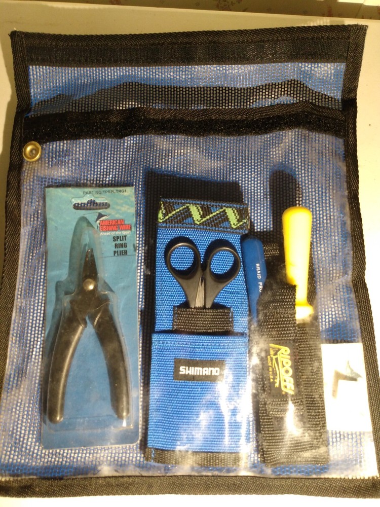 Nantucket bound inc lure bag, shimano scissors, split ring pliers, sharpener.