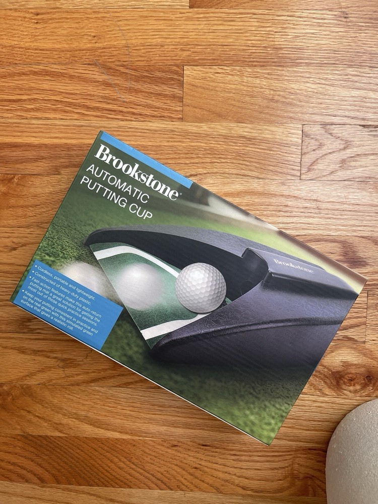 Brookstone Cordless Automatic Putting Cup Portable & Lightweight