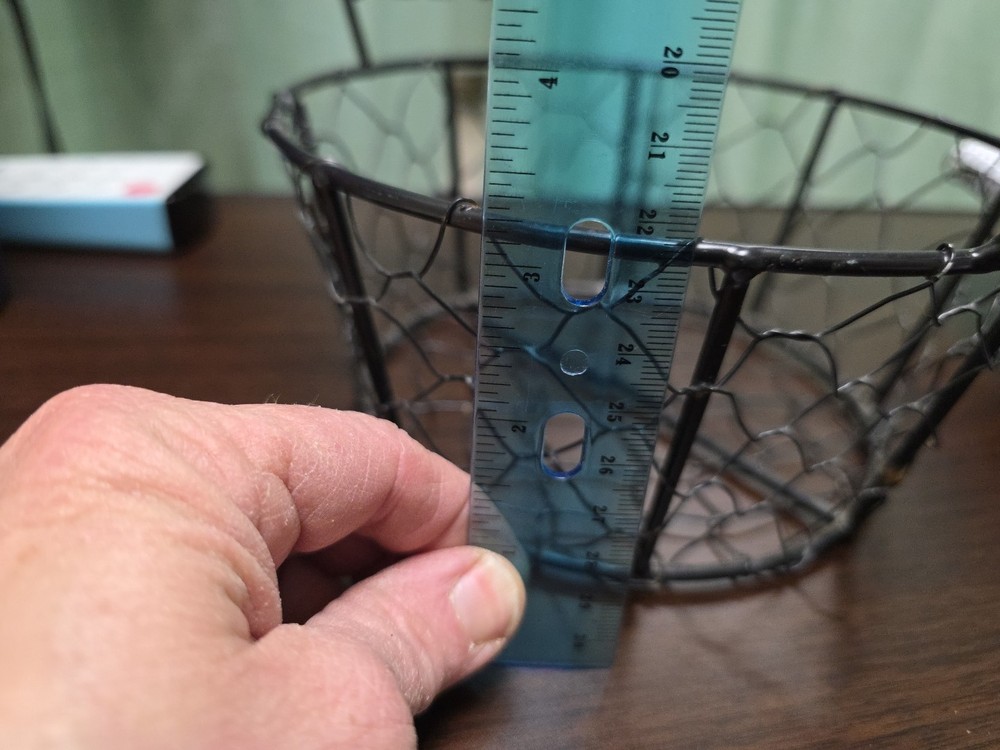 Chicken wire style basket. Wood handle. Size medium. Home decor. Easter.