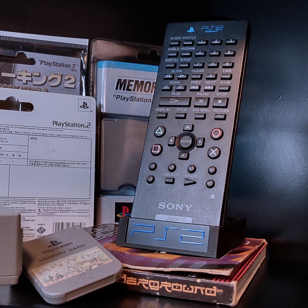 PlayStation 2 DVD Remote Control Stand Holder Storage Display SCPH-10150 PS2