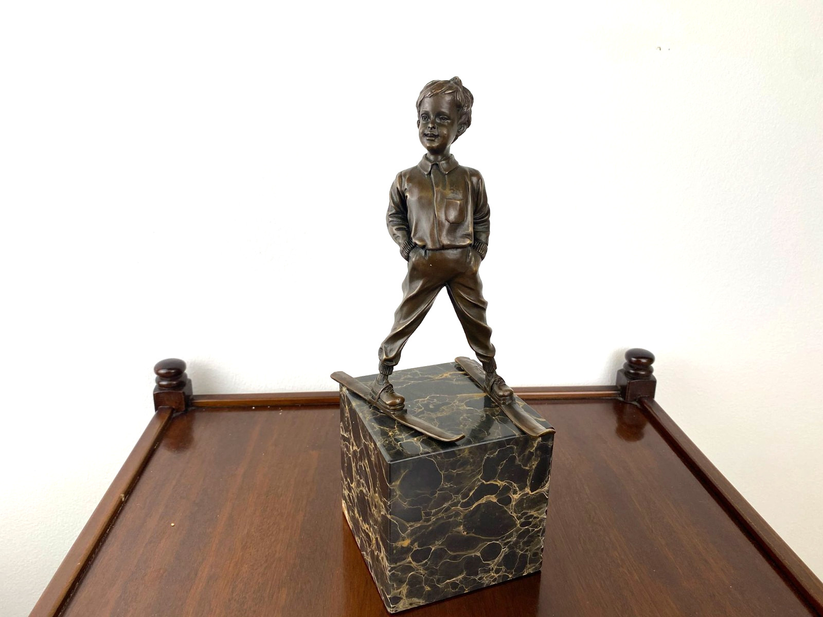 Bronze sculpture boy with ski on marble base after Ferdinand Preiss