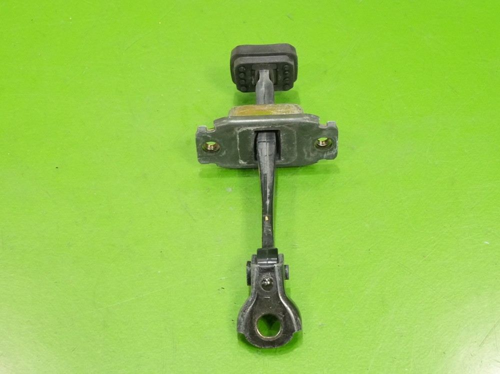 02-06 RSX OEM driver left door detent stop strap check