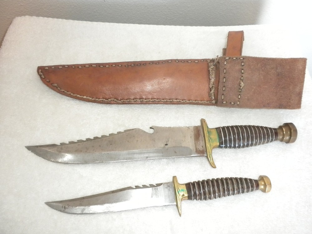 TWO KNIVES SAME DESIGN WITH LEATHER HOLDER