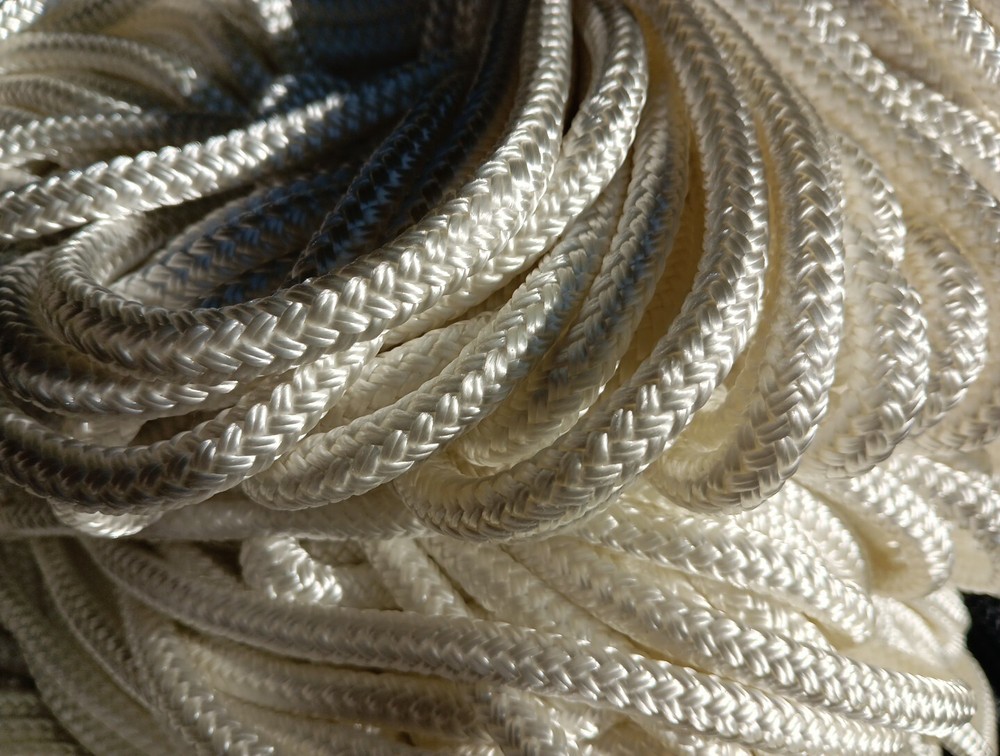 5/16 x 100 ft Pre-Cut Double Braid Polyester rope hank. White.