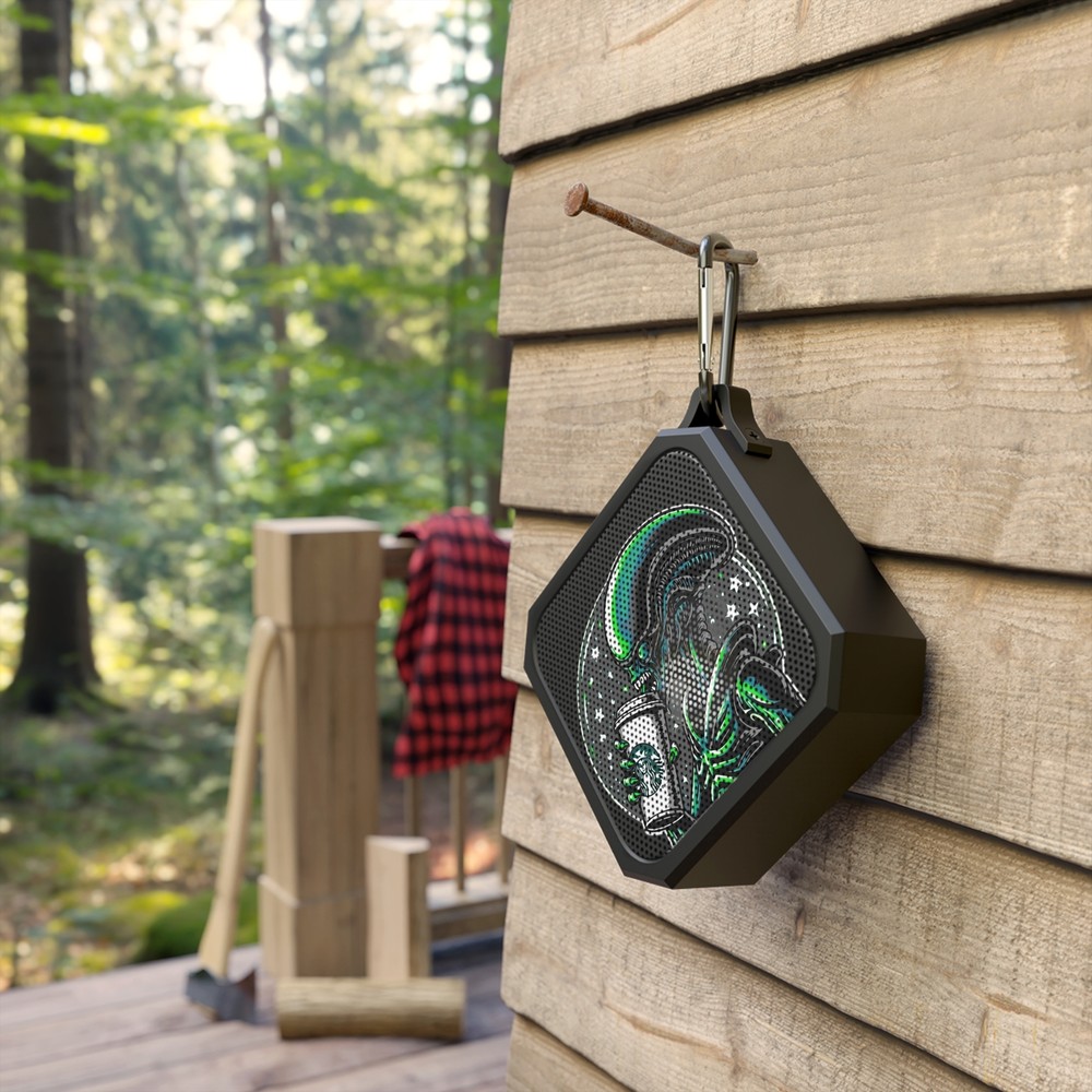 Blackwater outdoor Bluetooth speaker, a fun alien drinking coffee.