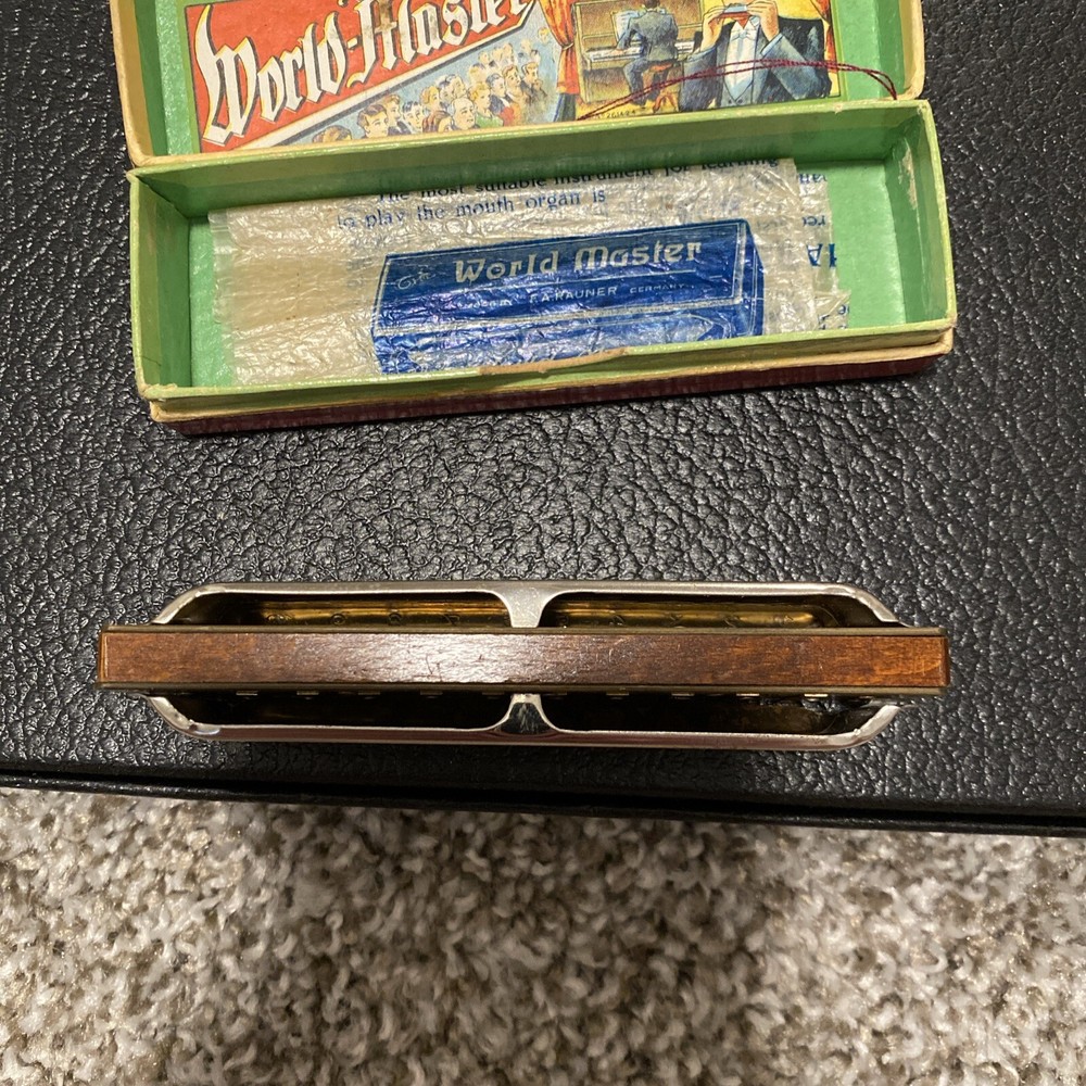 Vintage world master brass harmonica