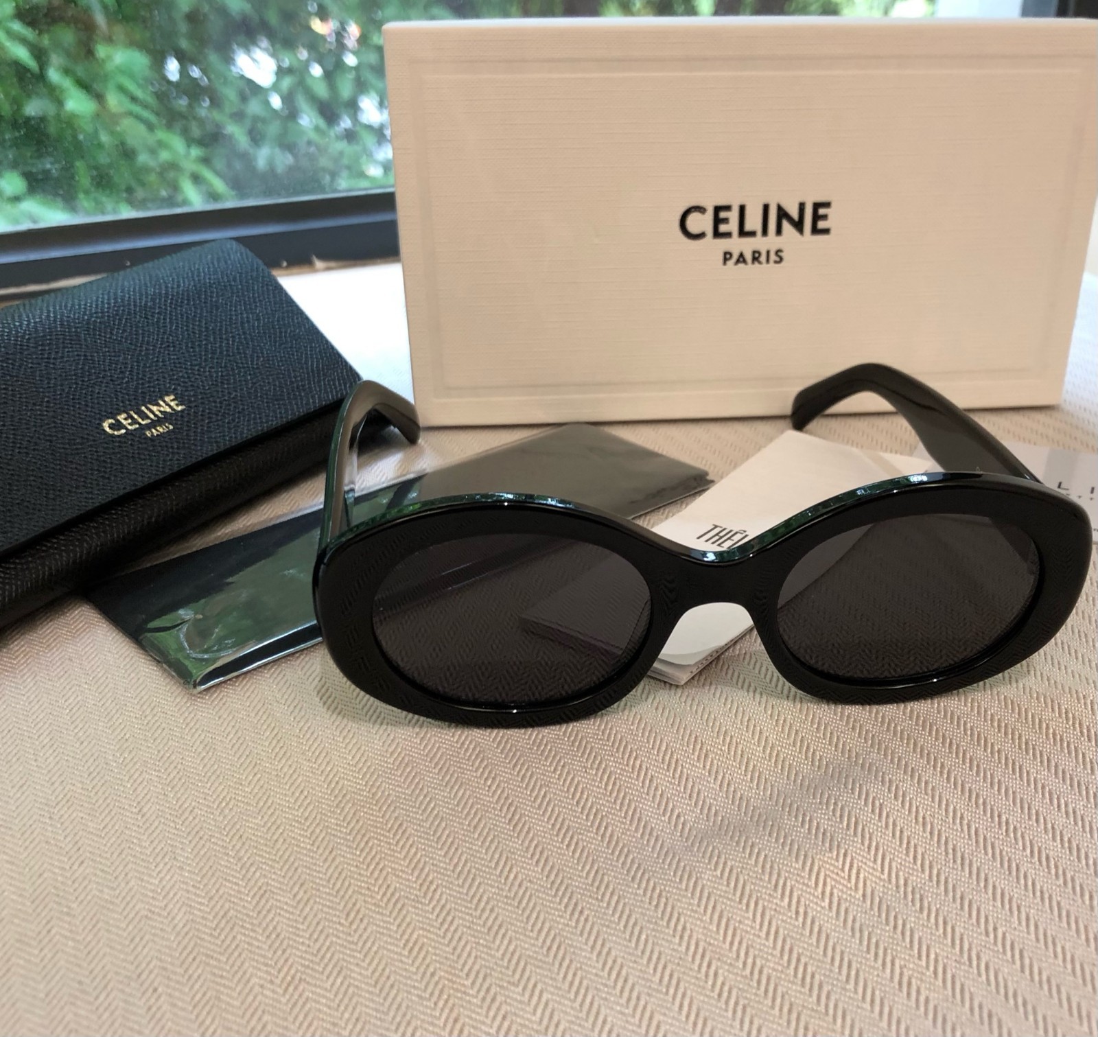 Celine CL40194U Triomphe Oval Sunglasses Black Frame Dark Grey Lens Women