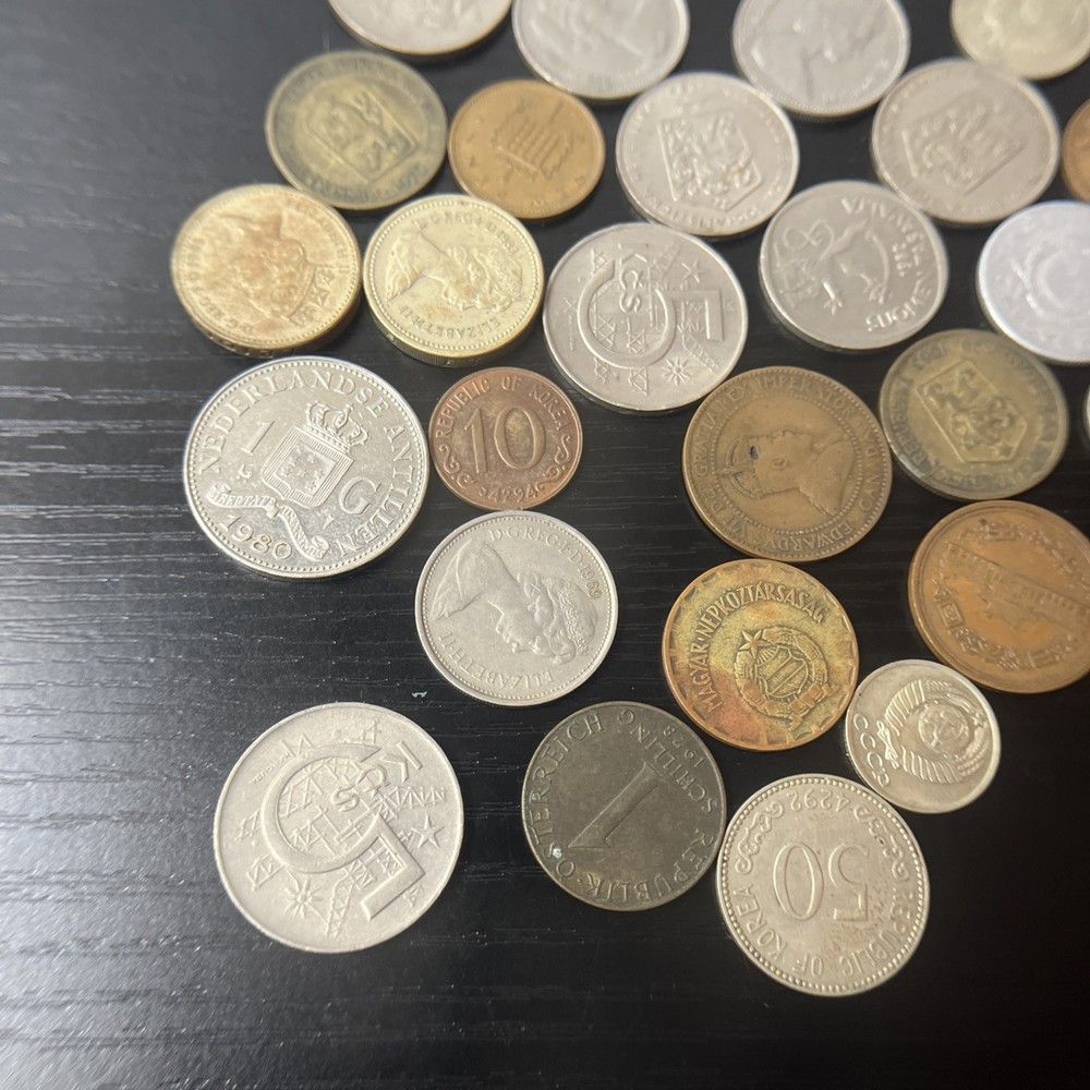 34 International Coins.