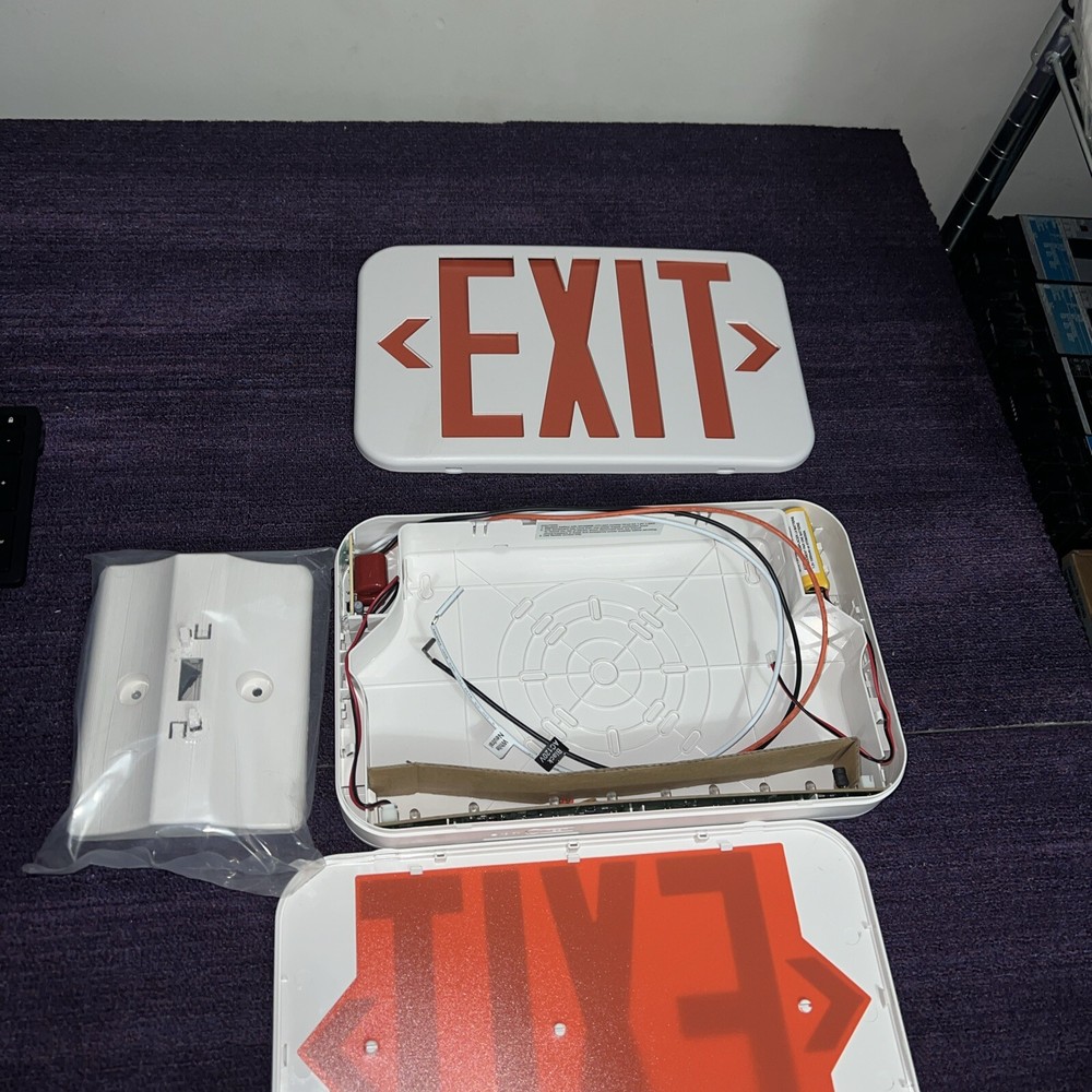 New Exit Sign .Face Plate and mounting bracket Battery pack tested image.