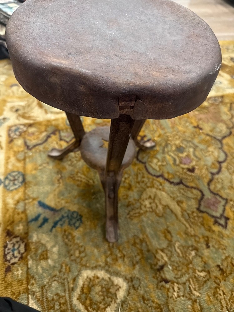 antique metal milking stool