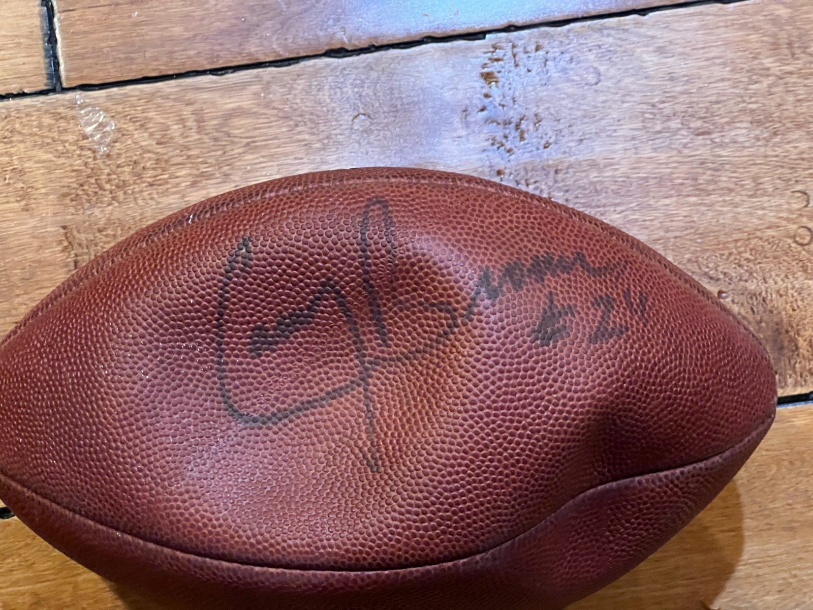 UNKNOWN SIGNED OAKLAND RAIDERS GAME USED WILSON PRO FOOTBALL (FROM EQUIP MANAGER