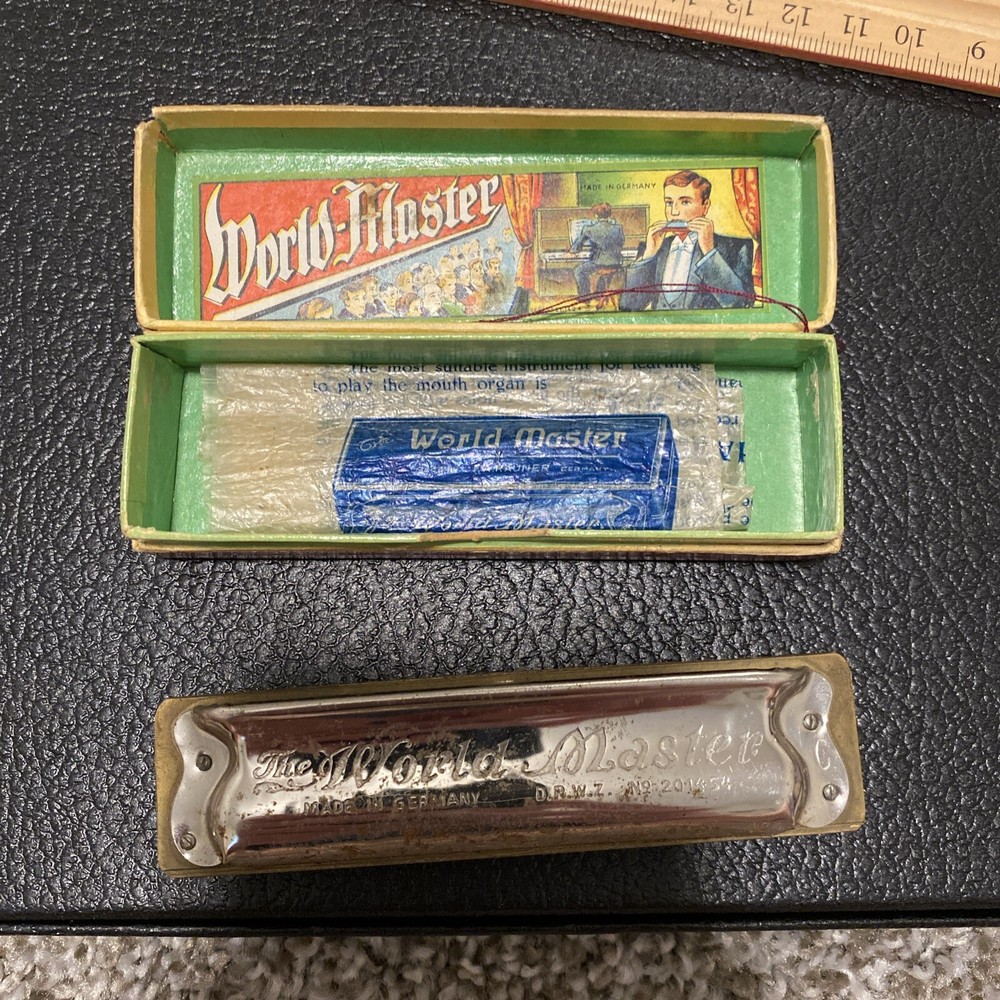 Vintage world master brass harmonica