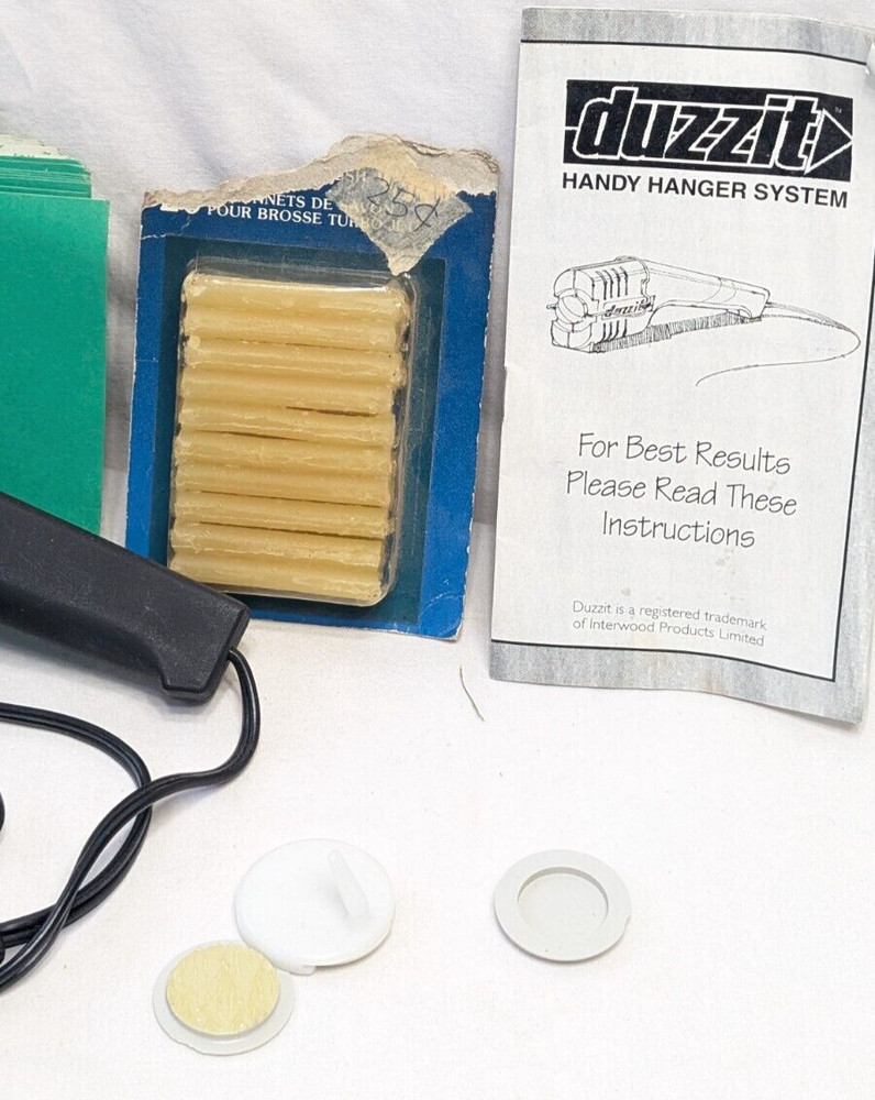 Duzzit Handy Hanger System machine with instructions & extra sticky items???