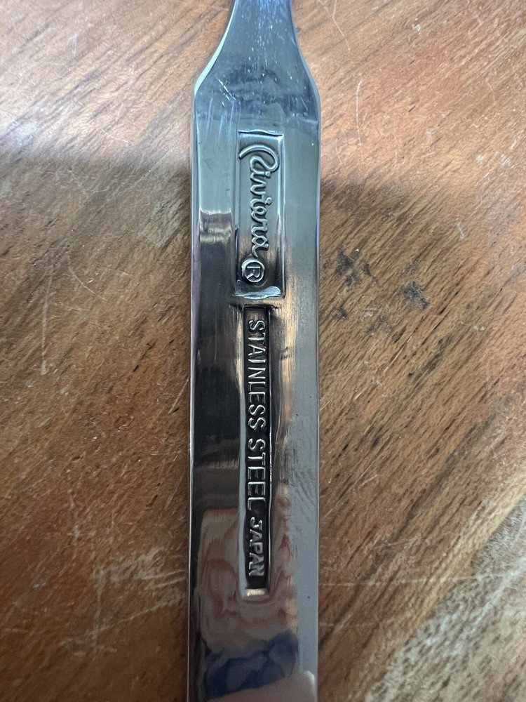 The spoon measures approximately 7 1/2" long.