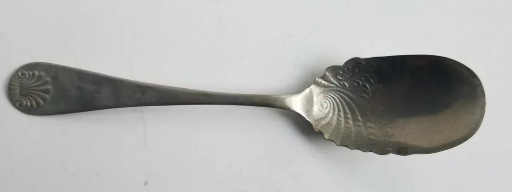 Antique 6 in Shell shape and Design spoon marked Yukon silver warranted