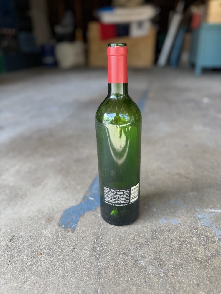 Empty 2018 Dominus Wine Bottle