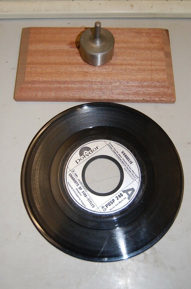 Dinker for jukebox records --cuts clean accurate holes easily.