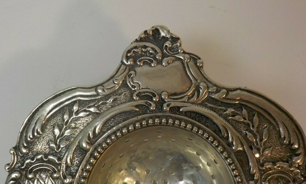 Continental .800 Silver Tea Strainer, Repousse Design, c. 1900, 58 grams