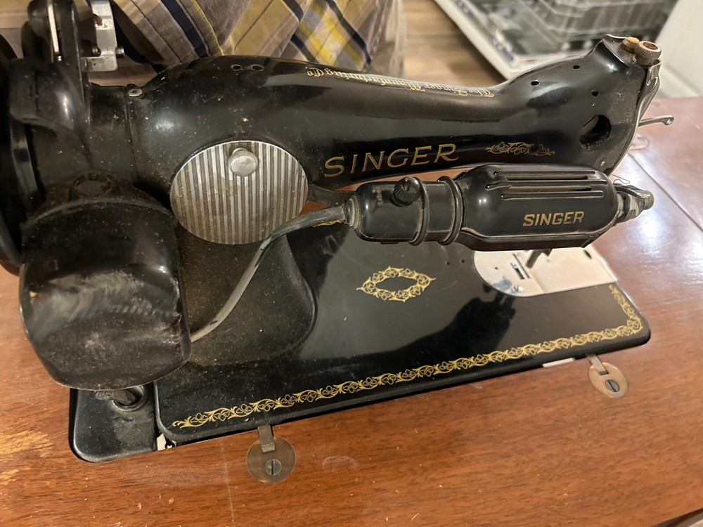 Singer Sewing Machine 1951 with custom table, stool, and accessories