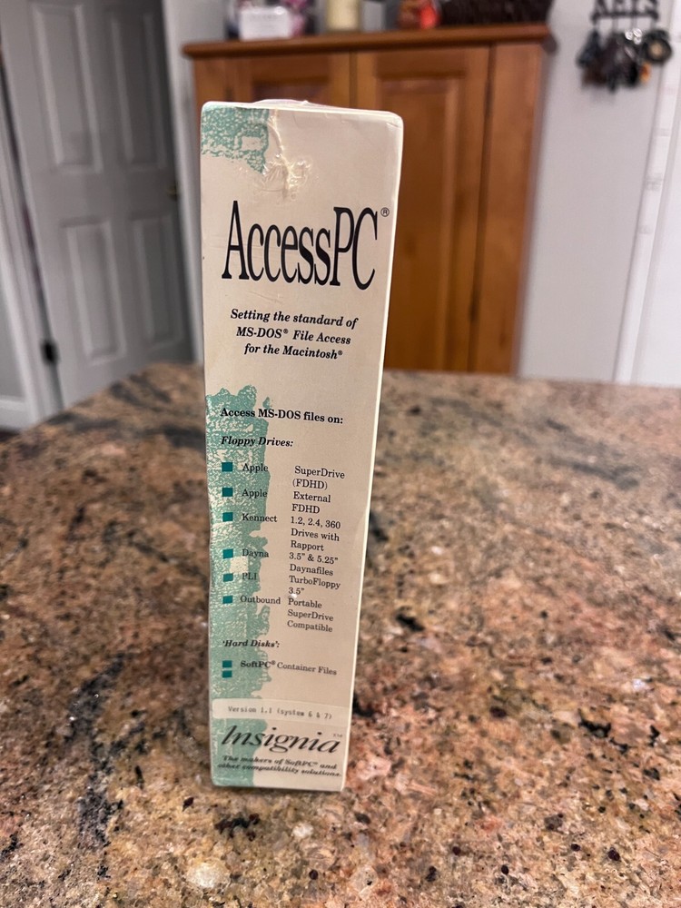 AccessPC Version 2.0 MS-DOS Macintosh File Exchange Utility Insignia Solutions