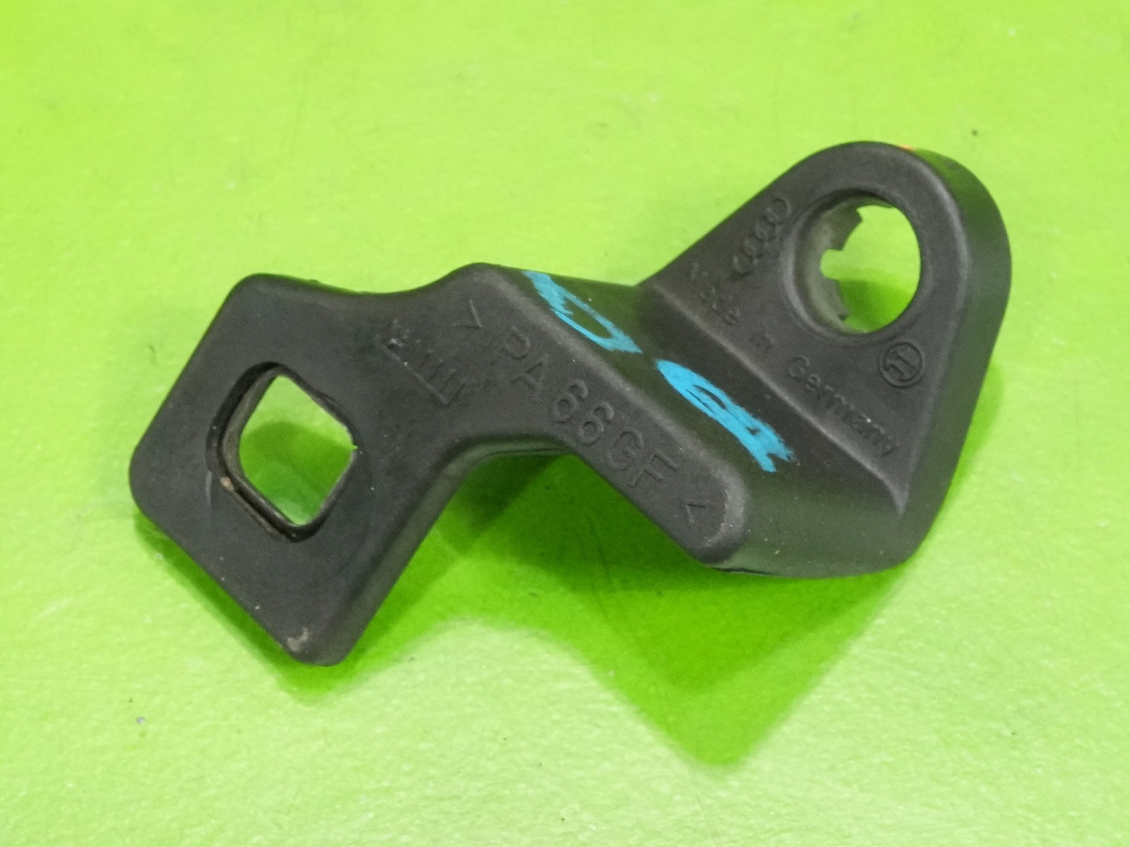 00-06 Audi TT OEM 8N0941454 passenger front headlight lamp bracket mount tab