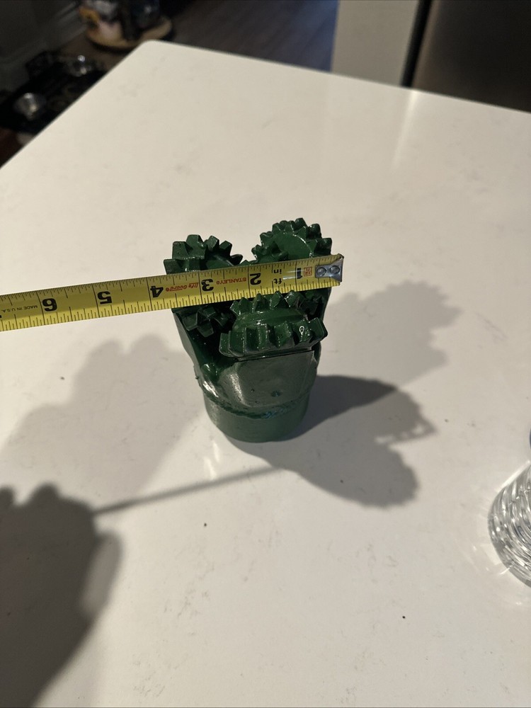 Tricone drill bit