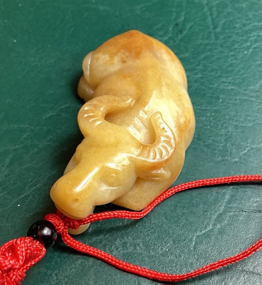 Brown 2 Sided Jadeite Ox Translucent Pendant