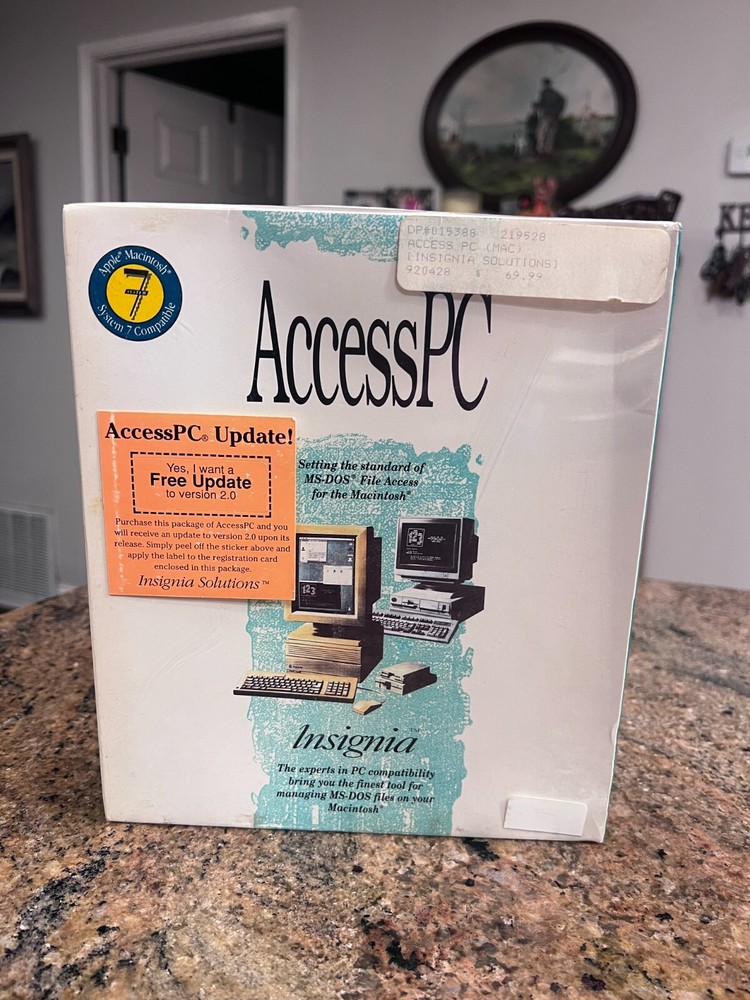 AccessPC Version 2.0 MS-DOS Macintosh File Exchange Utility Insignia Solutions