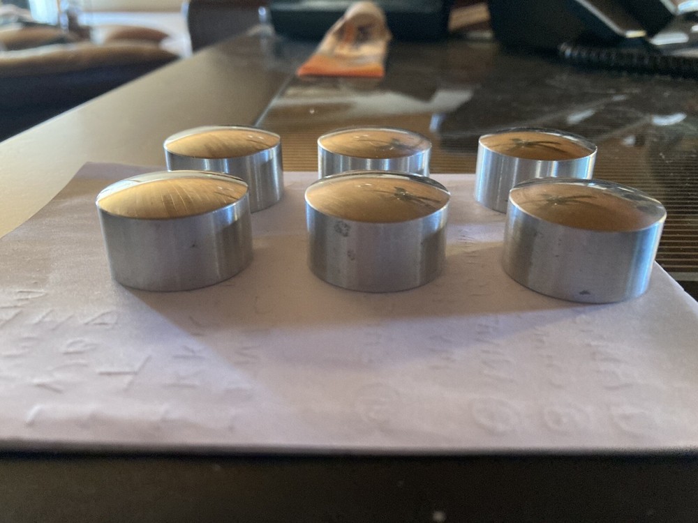 Piston pin plugs