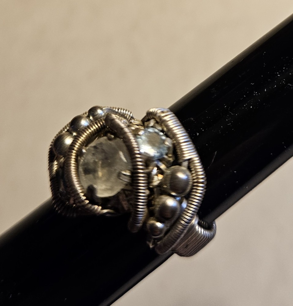 Handmade Orion Design Wire Wrapped Ring Featuring White And Blue Topaz