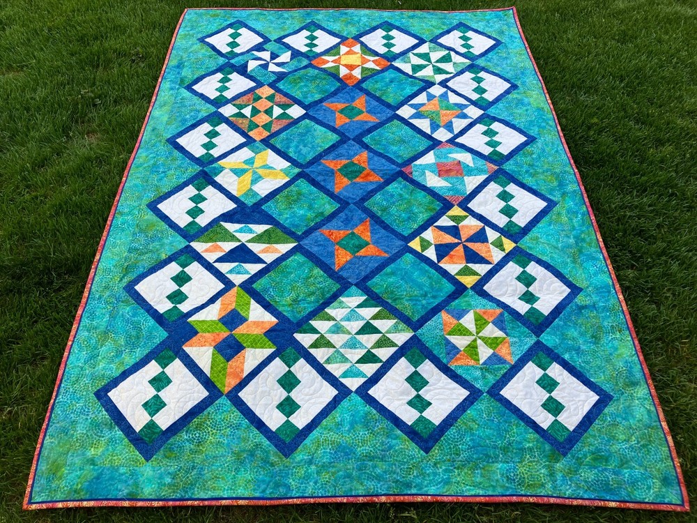 Handmade Multi color patchwork with Blue sashing 58" X 82.5"