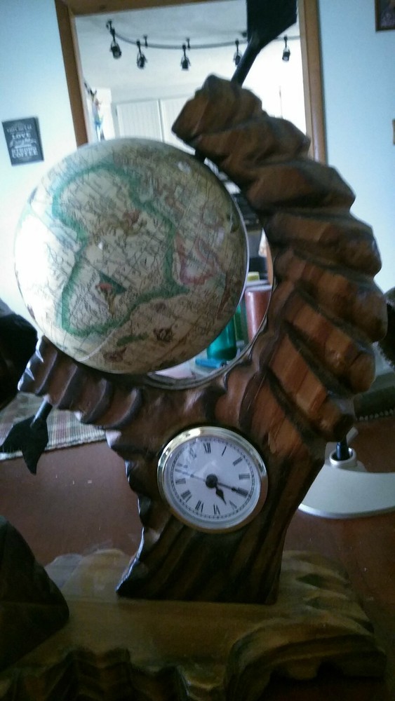 A Very Ornate Desktop Globe With Quartz Clock