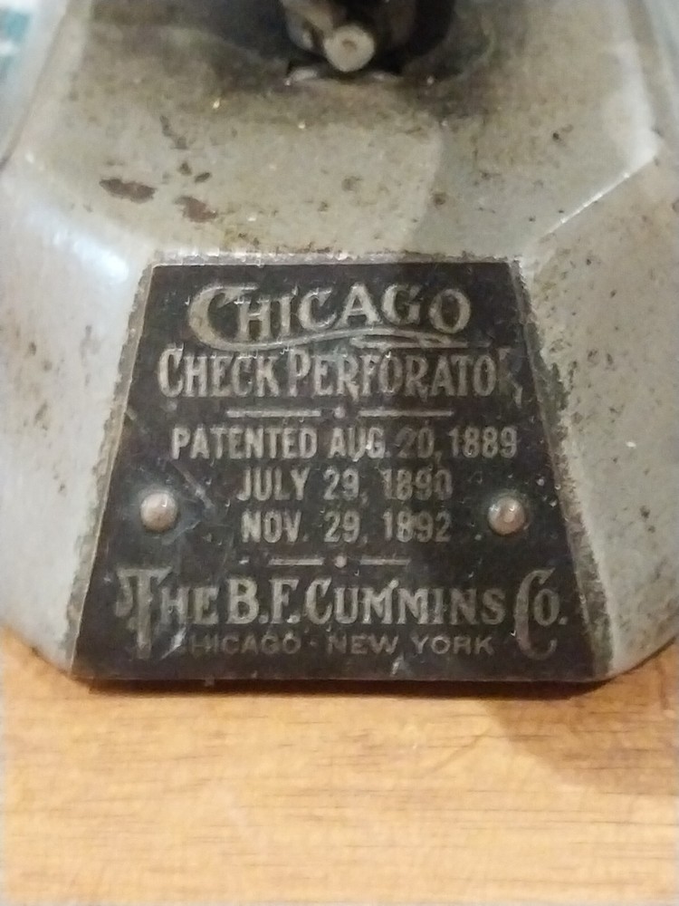 antique check perforator