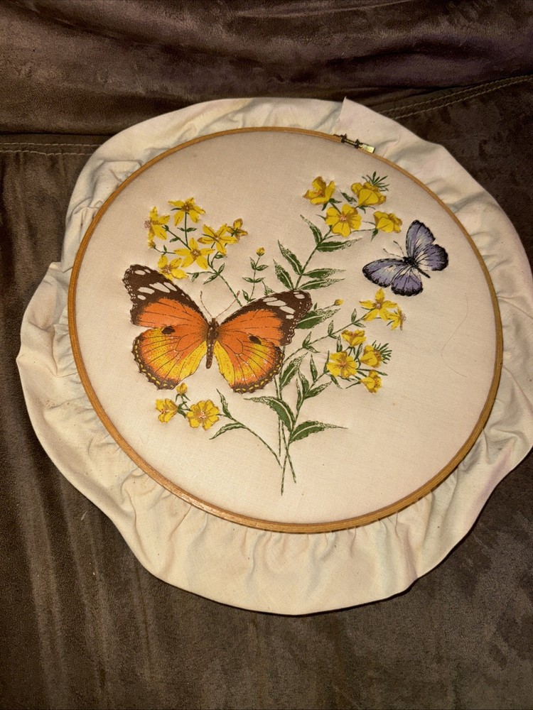 Three Embroidery Hoops With Finished Pieces