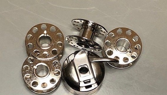 Sewing Machine Bobbin Case Plus 10 Bobbins That Fit Several Brother Models