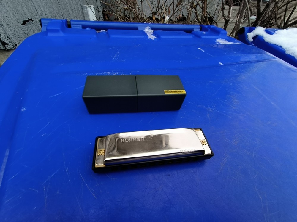 Used HARMONICA SAYS HOHNER ON IT WITH CASE