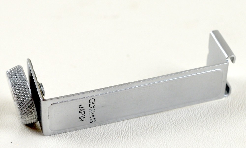 Olympus Pen (EE, D) accessory/flash shoe bracket.
