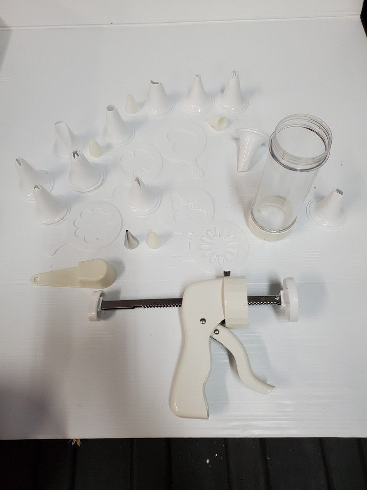 White plastic Cookie Press Disc Cutouts -with extras