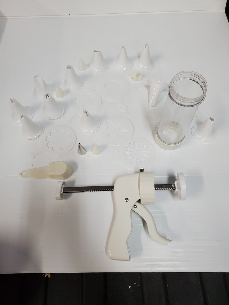 White plastic Cookie Press Disc Cutouts -with extras