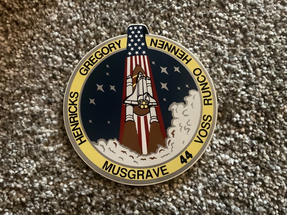 NASA Space Shuttle Memorabilia: Sticker, Plastic Cups, and Commemorative Program