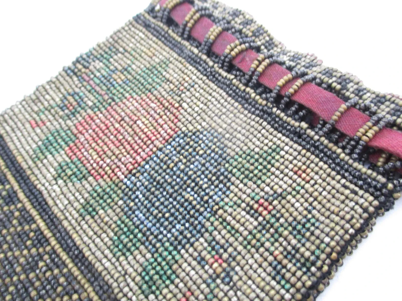 A Deco style lorgnette with guard chain