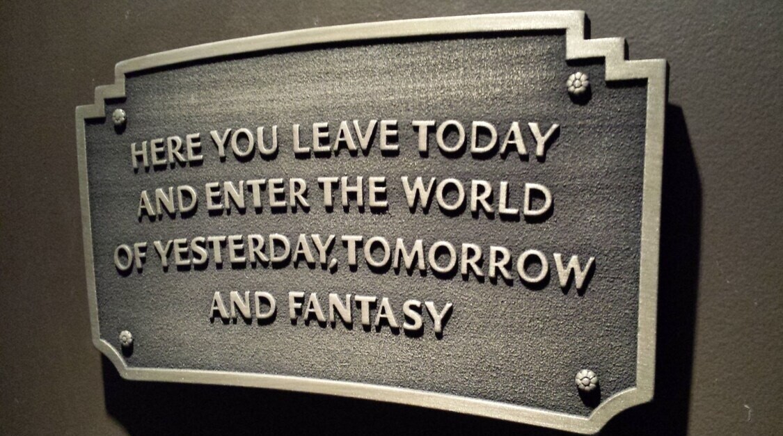 Disneyland entranceway sign plaque