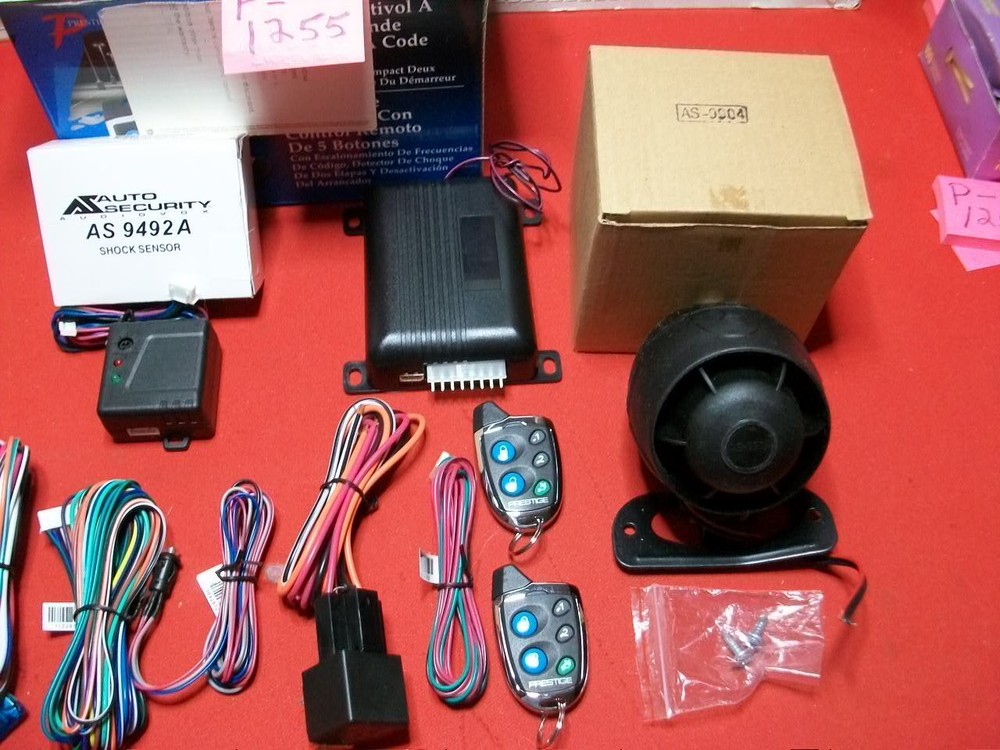 PRESTIGE SECURITY SYSTEMS # APS510C 5 BUTTON CODE HOPPING REMOTE SECURITY SYSTEM