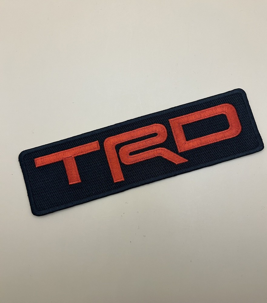 TRD Toyota Racing Development Iron On Patch. 7.25”x2” Solid Red On Black